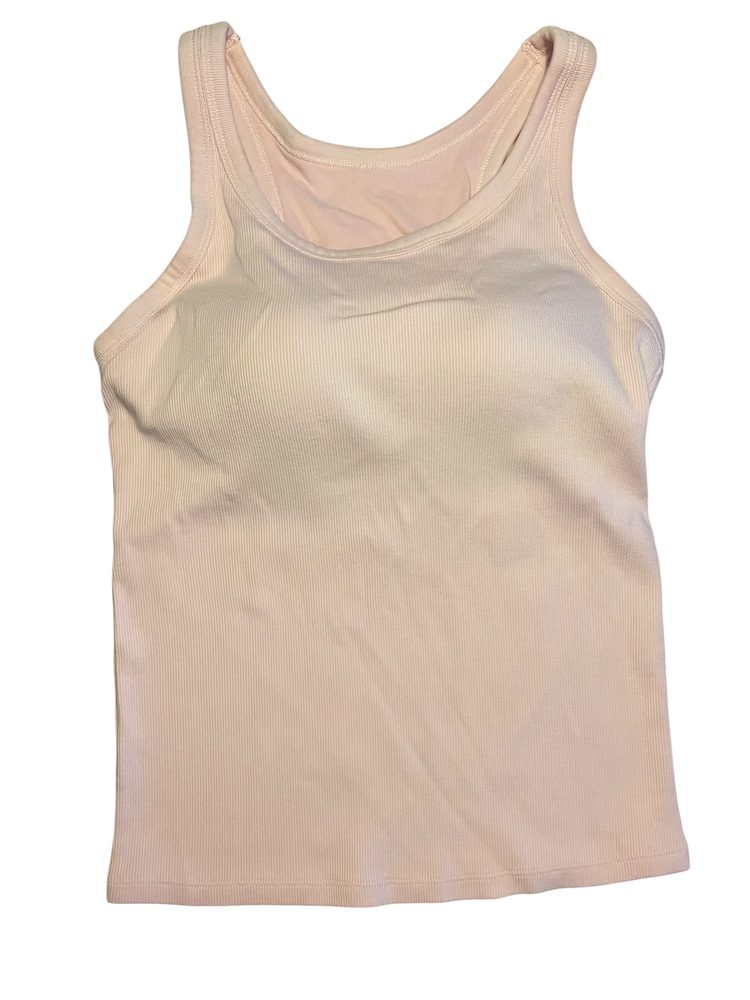 A soft pink UNIQLO ribbed layering tank photographed flat